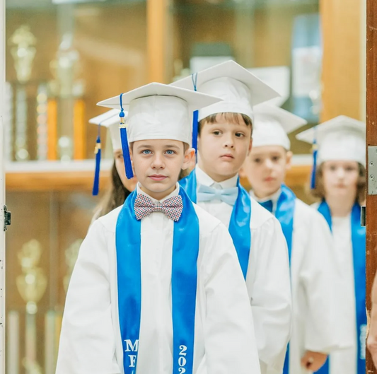 Unveiling Significance: The Elementary White Toga for Graduation